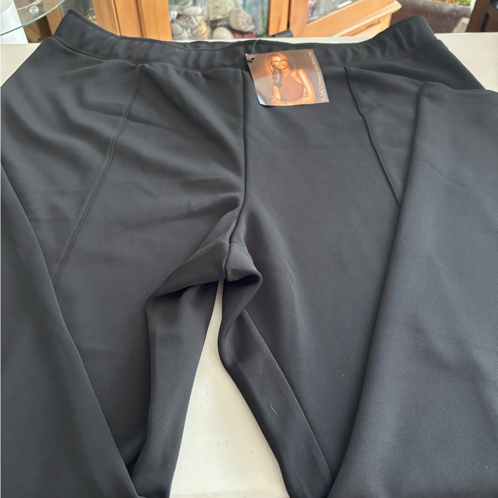 Woman’s  Black Pants. 1x. Very nice quality.  Smooth. Plus size